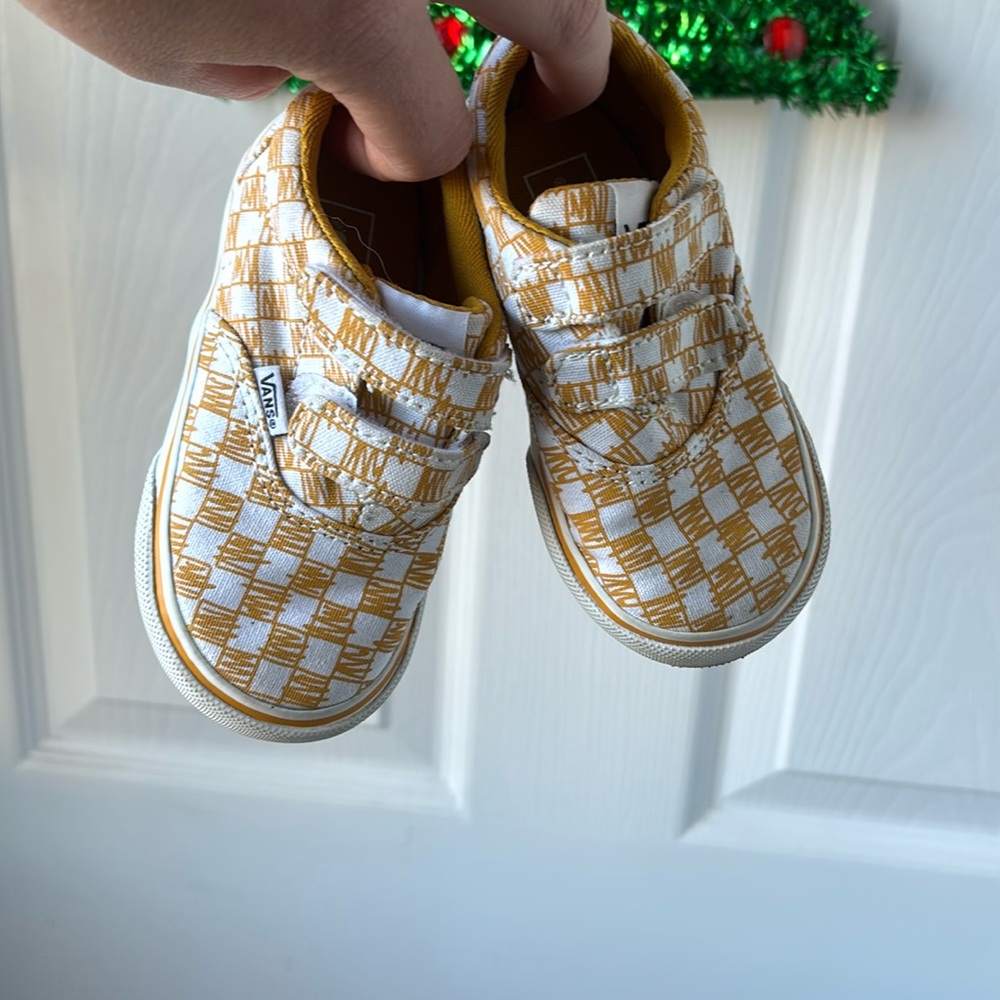 Vans checkered toddler sneakers.